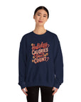 Navy blue sweatshirt with 'Holiday Calories Don't Count' text worn by a person on a white background