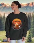 Person wearing a black sweatshirt with a campfire design and text on a white background
