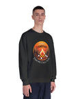 Person wearing a black sweatshirt with a campfire graphic and text on a white background