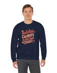 Man wearing a navy blue sweatshirt with colorful text on a white background