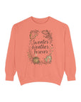 Coral sweatshirt with 'Sweater Weather Forever' text and floral design on a white background