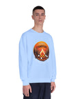 Person wearing a light blue sweatshirt with a 'Cozy Campfire' graphic on a white background