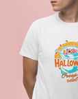 White t-shirt with Halloween-themed design on a pink background