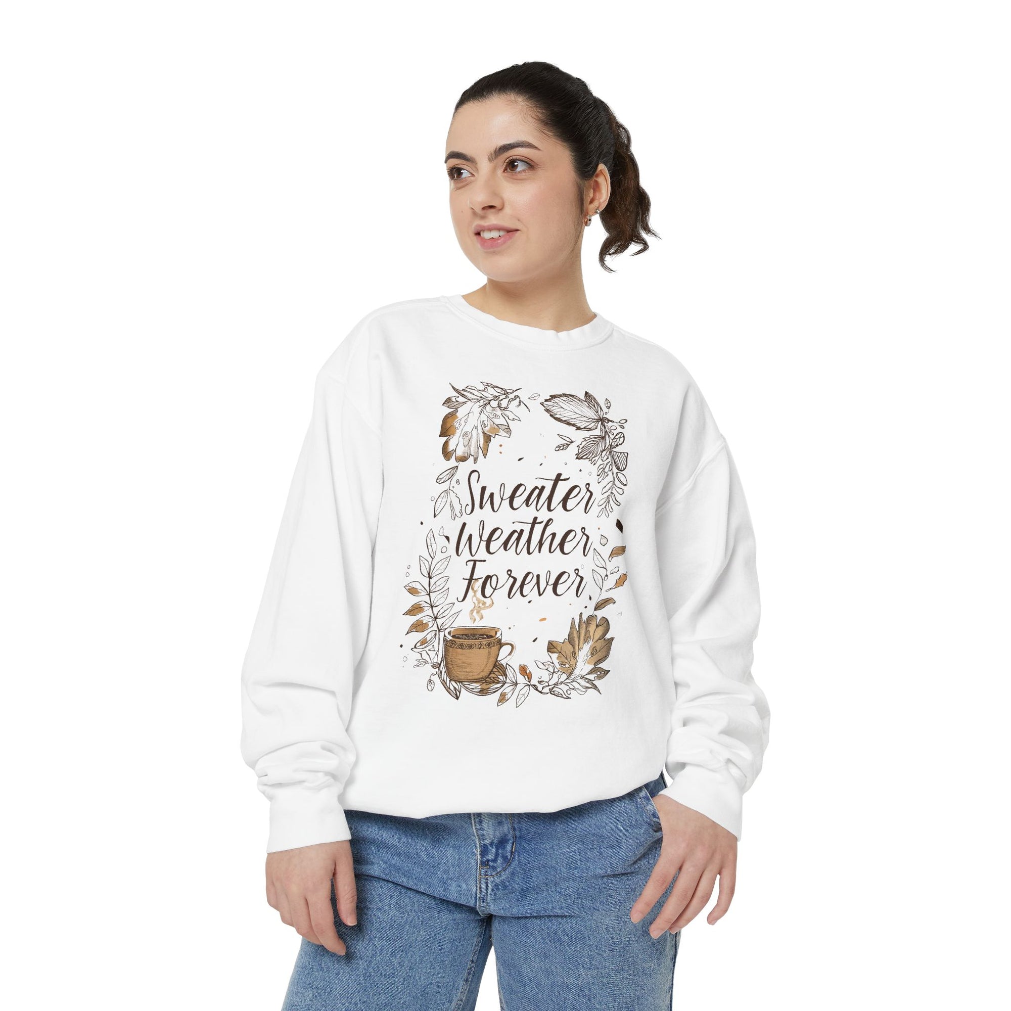 Woman wearing a white sweatshirt with 'Sweater Weather Forever' text and graphics on a white background