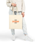 Person holding a beige tote bag with 'Your Design Here' text on a white background