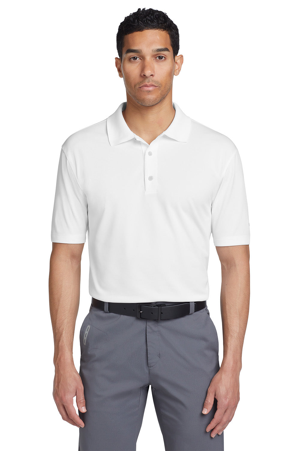 Man wearing a white polo shirt and gray pants on a white background