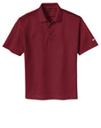 Maroon polo shirt on a white background