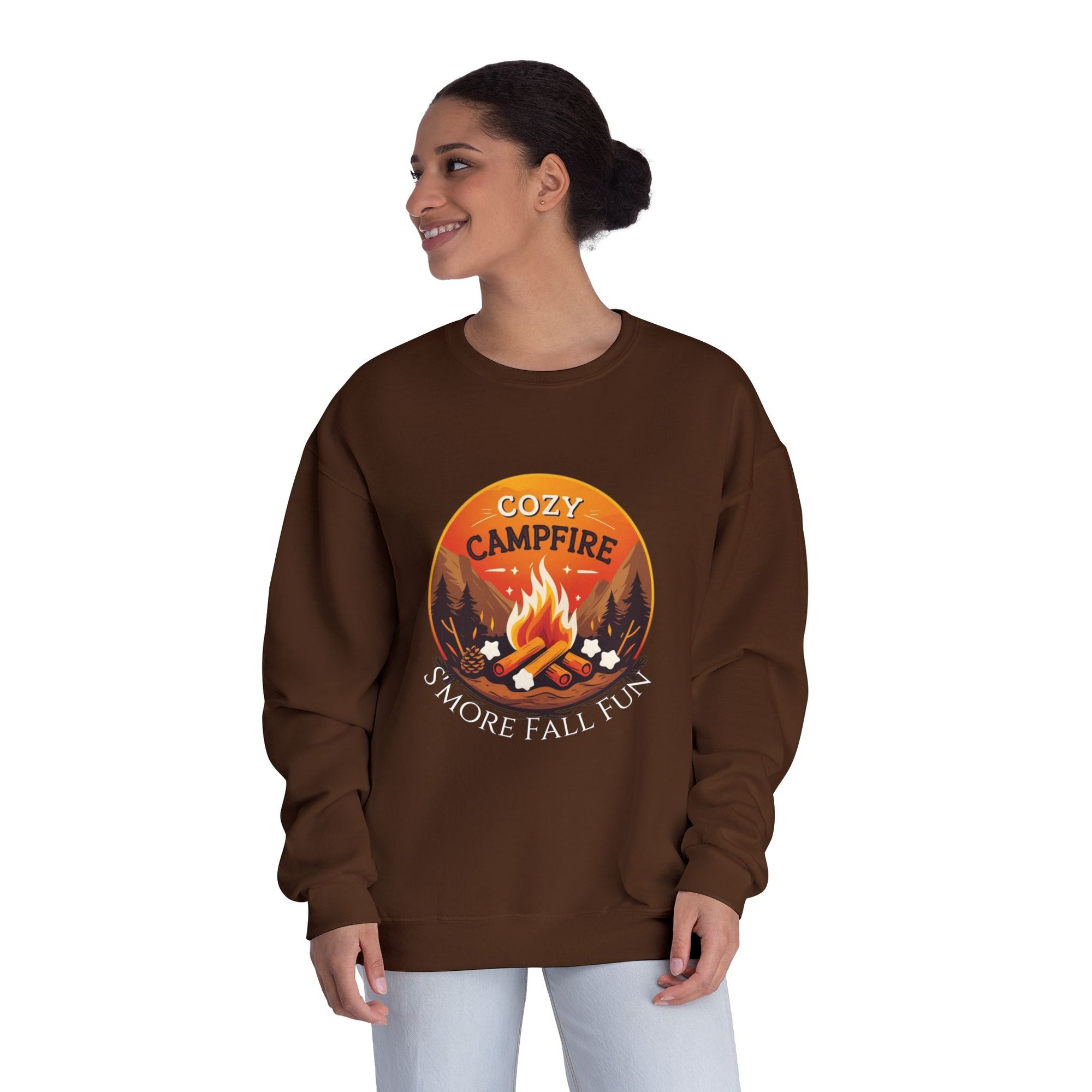 Woman wearing a brown sweatshirt with a campfire graphic and text on a white background