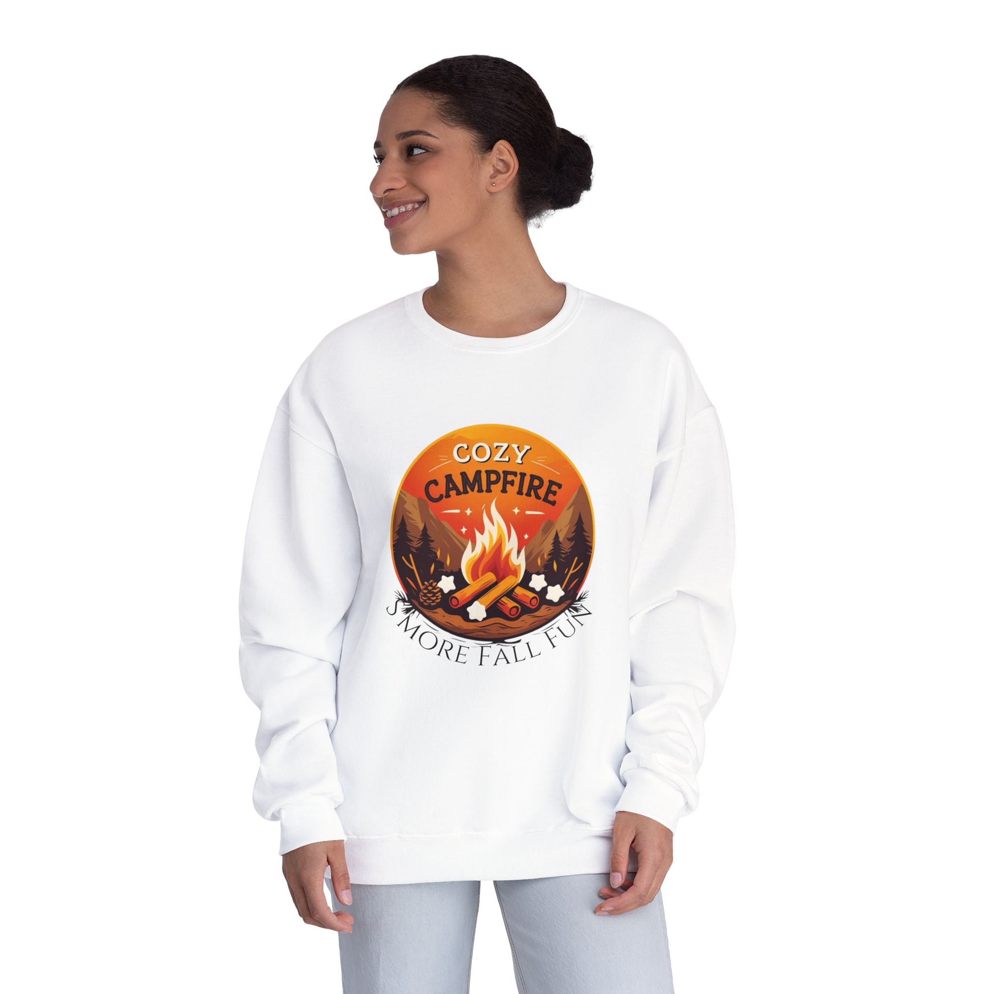 Woman wearing a white sweatshirt with a campfire graphic and text on a white background