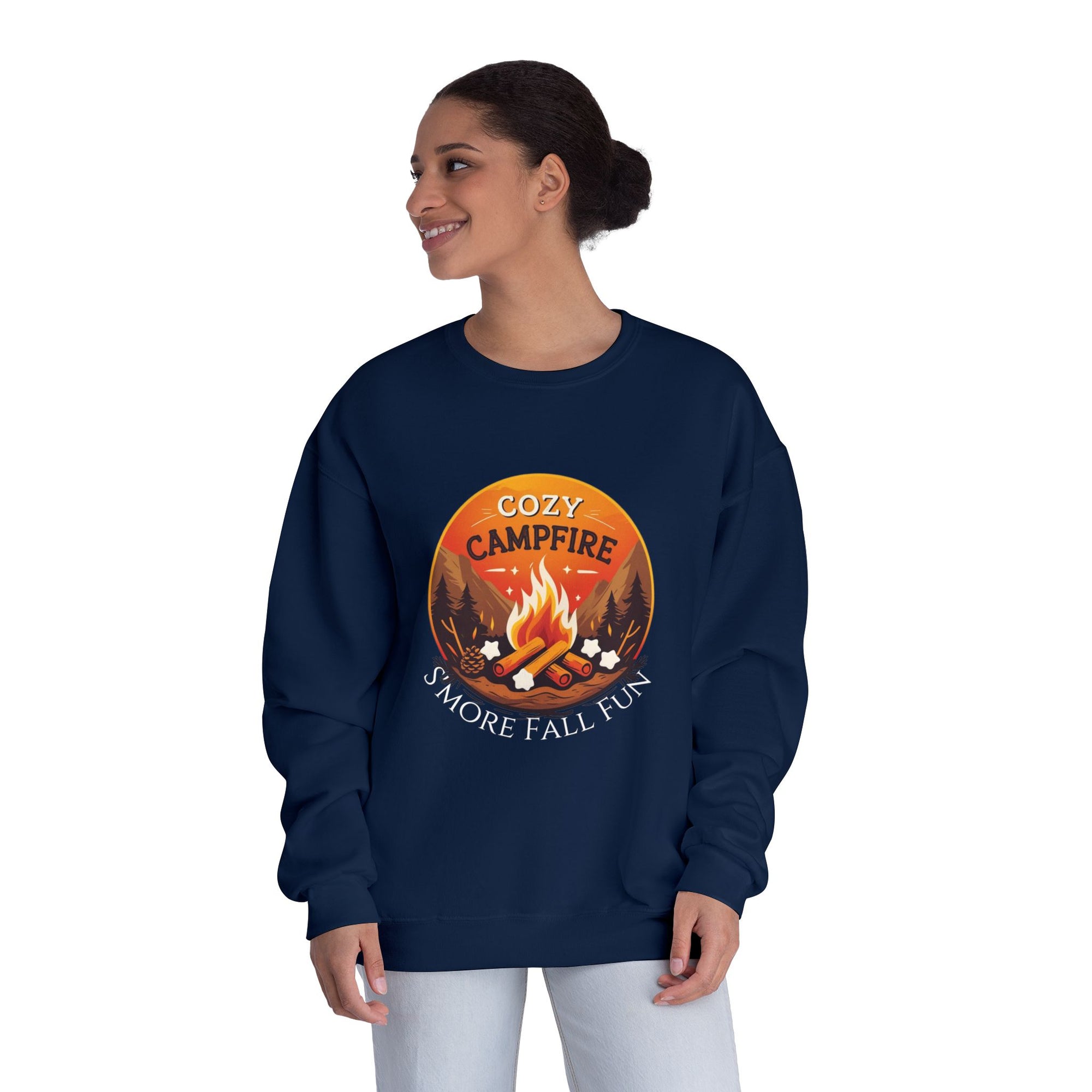 Person wearing a navy sweatshirt with a campfire graphic and text on a white background