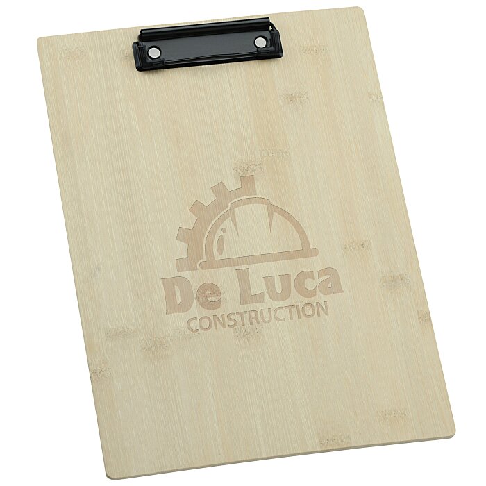 A light natural wood clipboard with a black metal clip at the top and an engraved logo for 'De Luca Construction' on the front, shown against a plain white background.