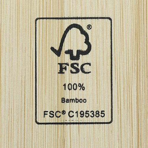 Close-up of a bamboo wood surface with a black FSC 100% Bamboo certification stamp.