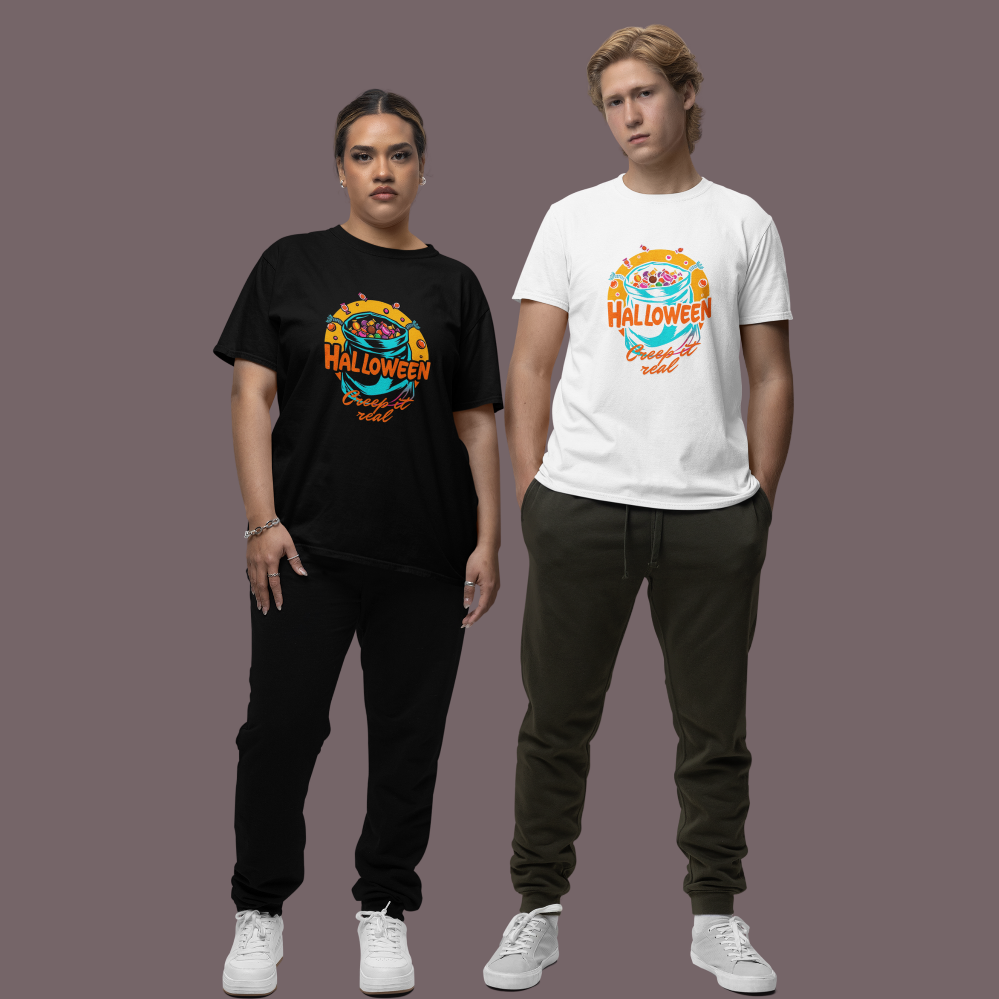 Two people wearing Halloween-themed t-shirts against a plain background