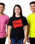 Three people wearing Hanes t-shirts in pink, black, and yellow on a white background